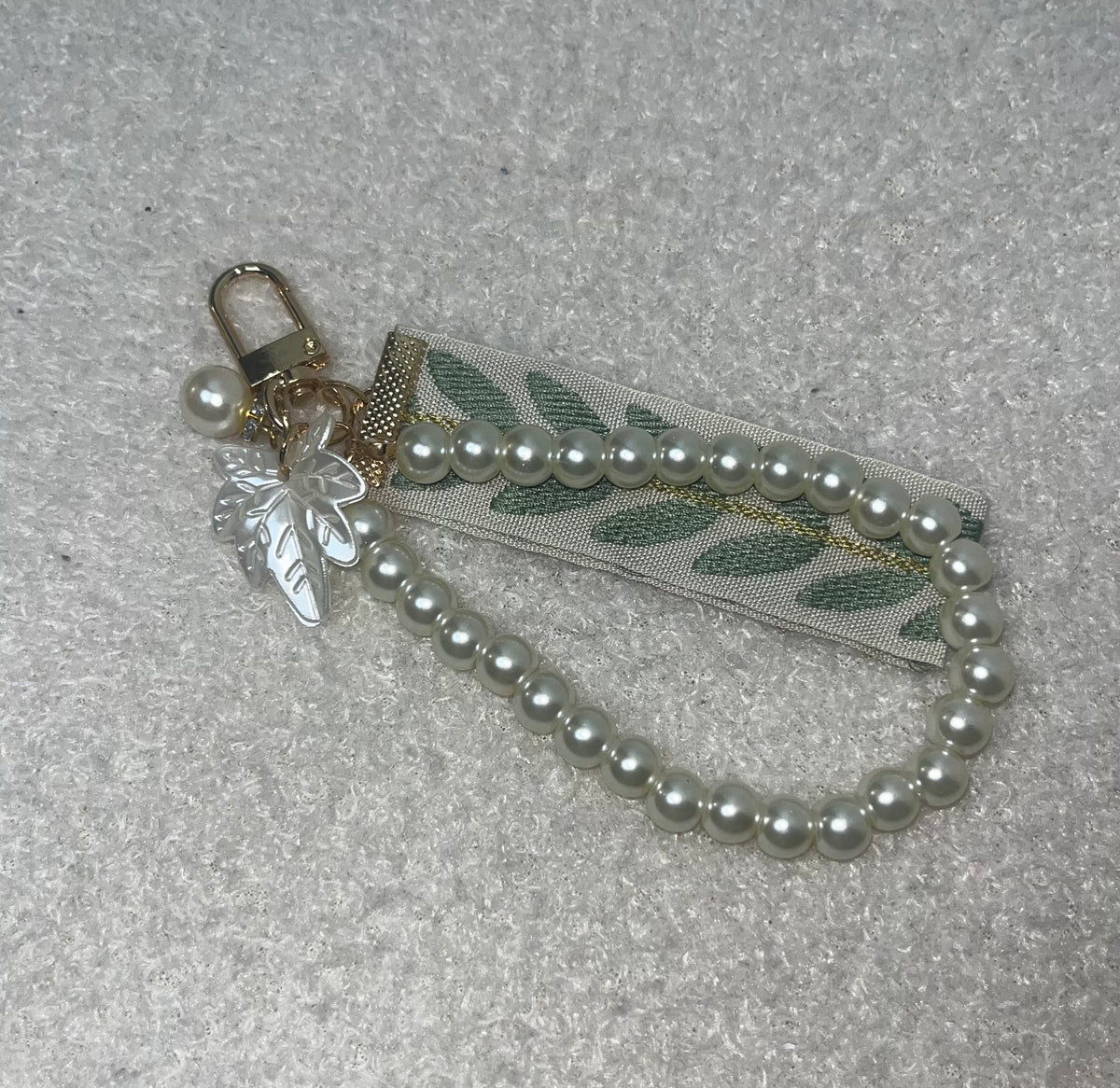 Porte clés perles/feuillage